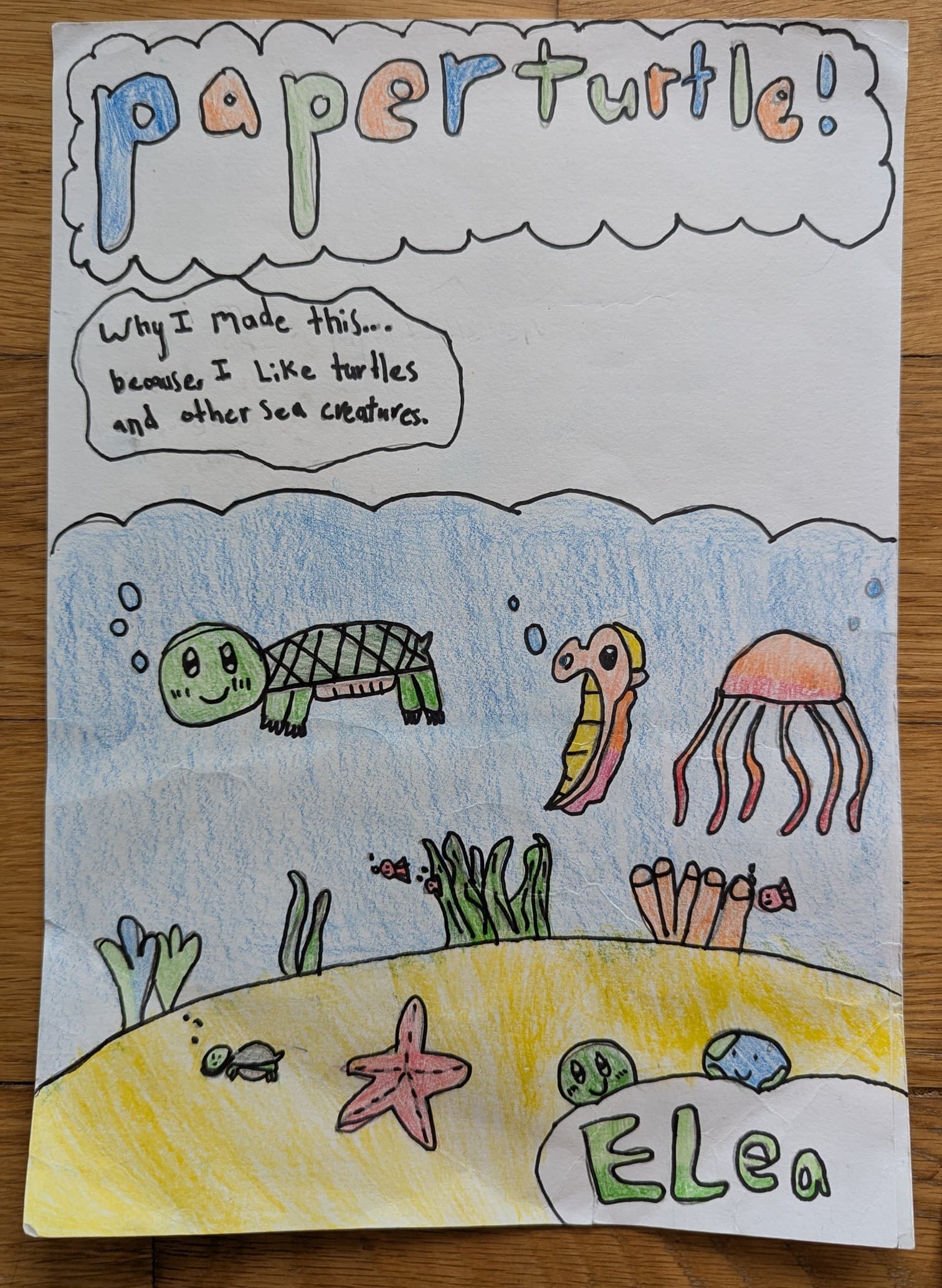 A child's drawing of sea turtles and ocean creatures